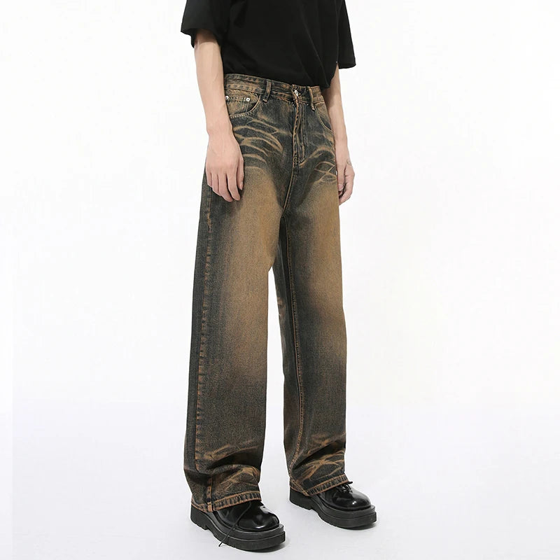 Desert Denim by 2KWRLD showing a pair of stylish, light-wash denim jeans with a relaxed fit and classic five-pocket design