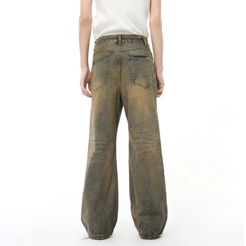 2KWRLD Jungle Denim jeans featuring a rugged camouflage pattern and classic denim design, displayed on a neutral background.