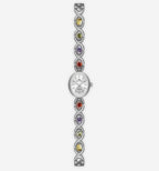 Silver vintage watch by 2KWRLD with a classic round face and leather strap, showcasing elegant timeless style.