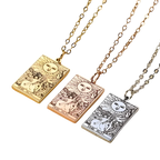 Gold Tarot Cards Necklace featuring the Wheel of Fortune design by 2KWRLD, showcasing a detailed, circular pendant with intricate tarot imagery.