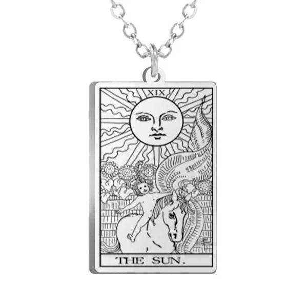 Gold Tarot Cards Necklace featuring The Wheel of Fortune design by 2KWRLD, with intricate card details and a stylish chain.