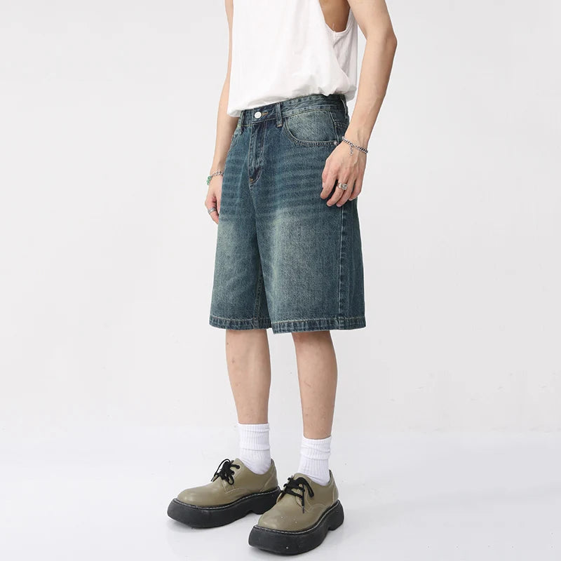 Light-wash React Jorts by 2KWRLD featuring distressed denim and frayed hems, casual summer shorts for men.
