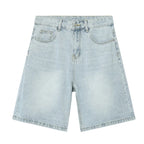 Light wash React Jorts by 2KWRLD featuring frayed hems and distressed details, perfect for casual summer style.