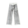 White Dirty Paint Denim jeans by 2KWRLD featuring distressed, paint-splattered design and slim-fit style.