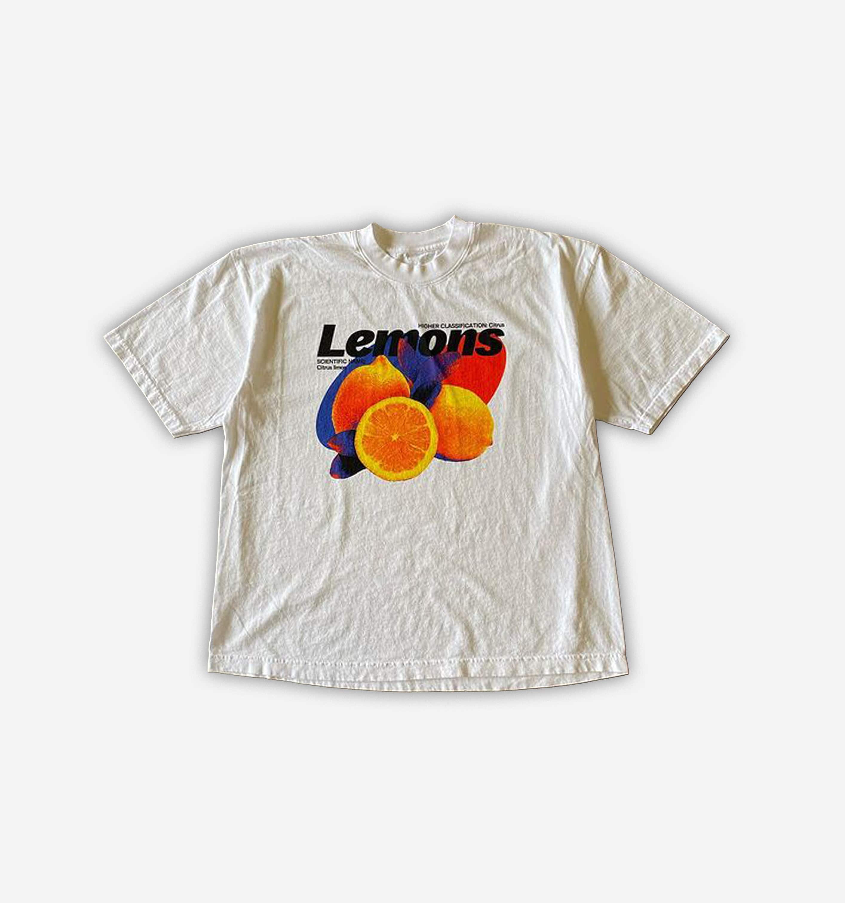 Light blue Lemons T-Shirt by 2KWRLD featuring a lemon print, made from 220 GSM fabric, shown in size XS.