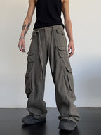 Black loose cargo pants from 2KWRLD featuring a relaxed fit and multiple pockets, ideal for casual and streetwear styles.