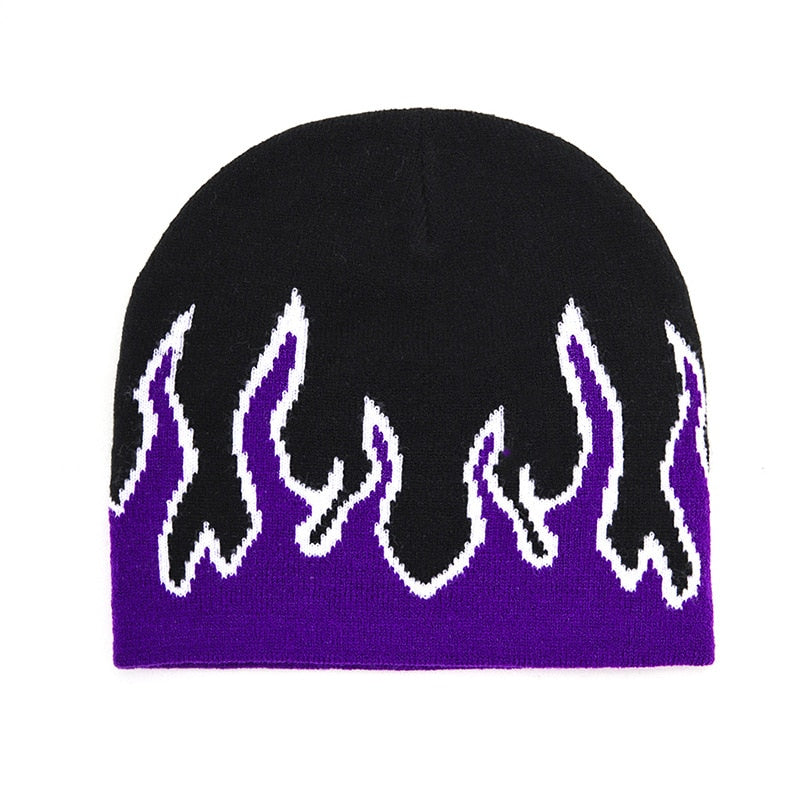 Black Fire Beanie by 2KWRLD featuring a flame logo, soft knit fabric, and a snug fit for cold weather warmth and style.