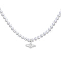 Silver Saturn necklace by 2KWRLD featuring a detailed Saturn pendant on a delicate chain.